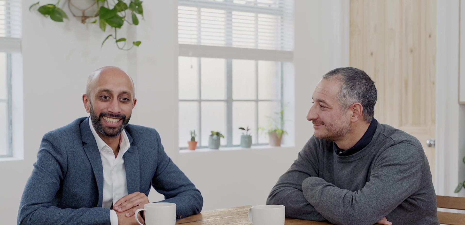 Yaser Martini and Jay Patel talking together for NHS Blood and Transplant